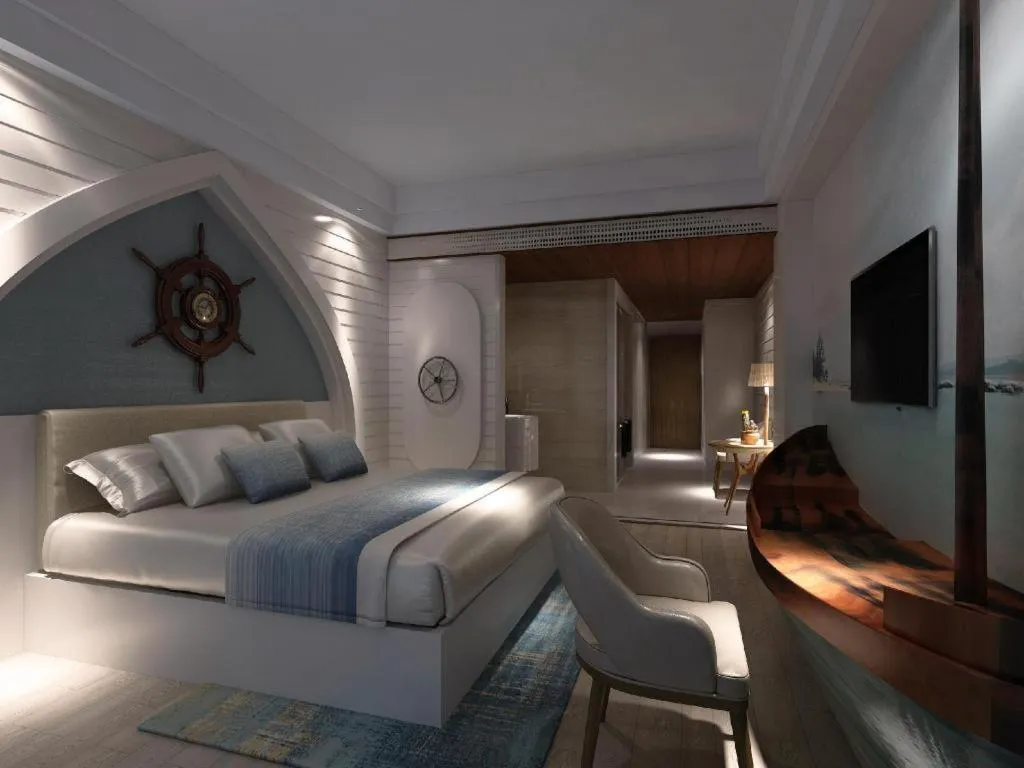 Bed in HuangMa holiday yacht view sea resort hotel