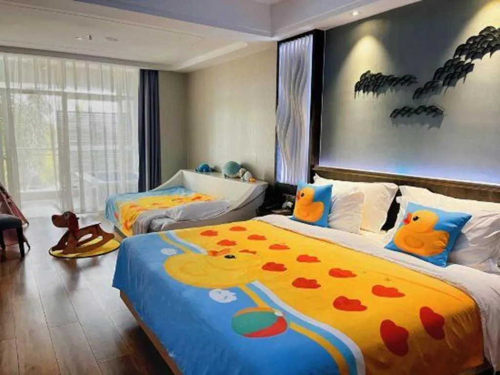 Bed in HuangMa holiday yacht view sea resort hotel