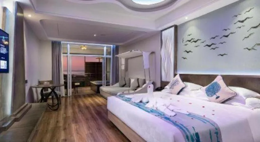 Bed in HuangMa holiday yacht view sea resort hotel