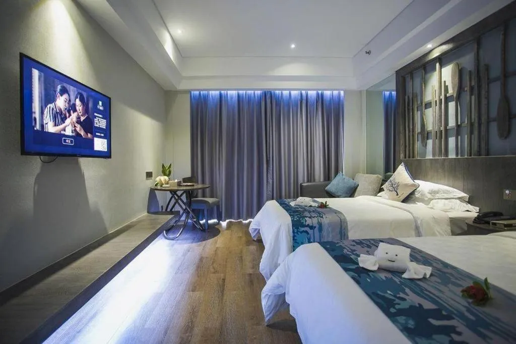 Bed in HuangMa holiday yacht view sea resort hotel