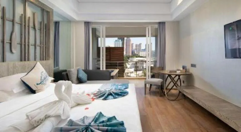 Bed in HuangMa holiday yacht view sea resort hotel