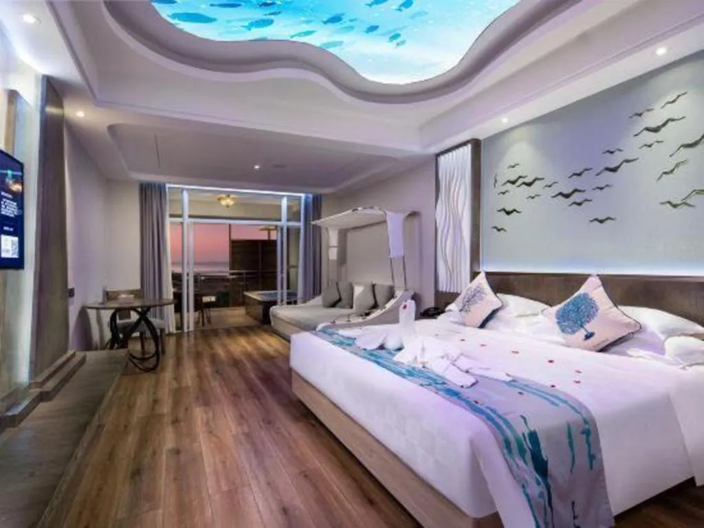 Bed in HuangMa holiday yacht view sea resort hotel