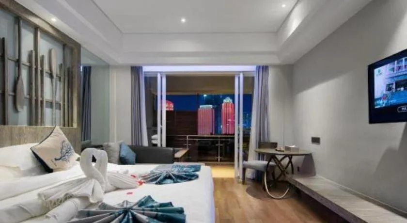 Bed in HuangMa holiday yacht view sea resort hotel