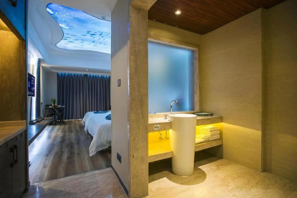 Bed in HuangMa holiday yacht view sea resort hotel