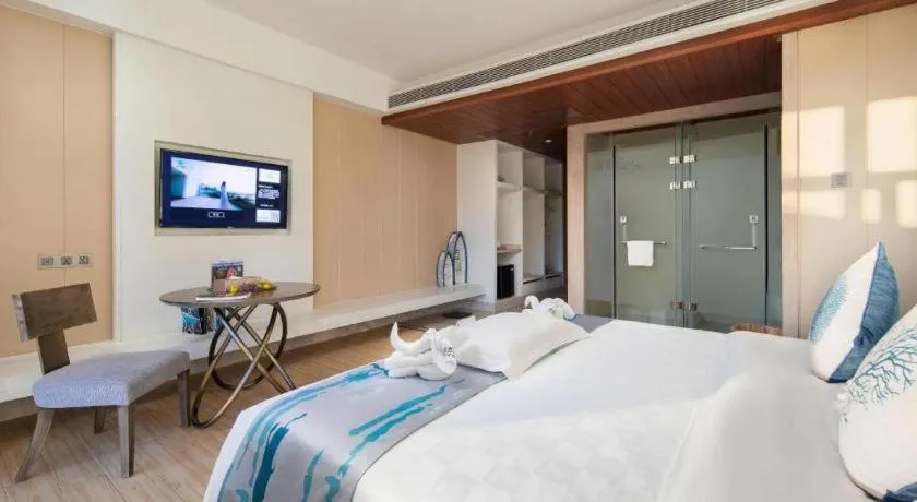 Bed in HuangMa holiday yacht view sea resort hotel