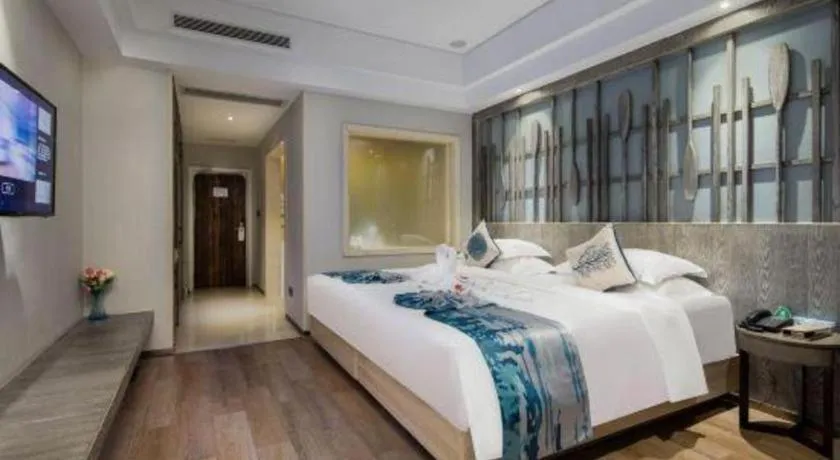 Bed in HuangMa holiday yacht view sea resort hotel