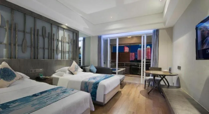 Bed in HuangMa holiday yacht view sea resort hotel