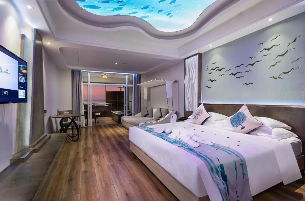 Bed in HuangMa holiday yacht view sea resort hotel