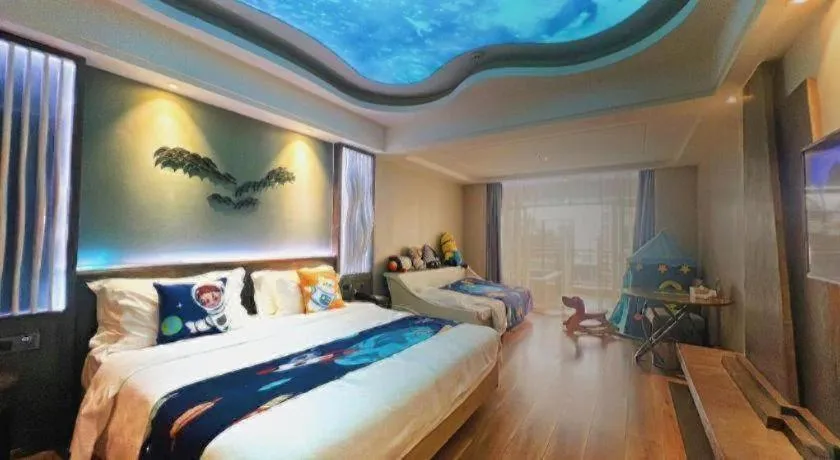 Bed in HuangMa holiday yacht view sea resort hotel
