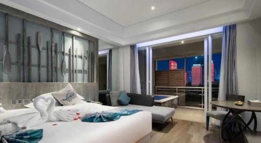 Bed in HuangMa holiday yacht view sea resort hotel