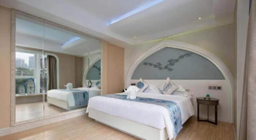 Bed in HuangMa holiday yacht view sea resort hotel
