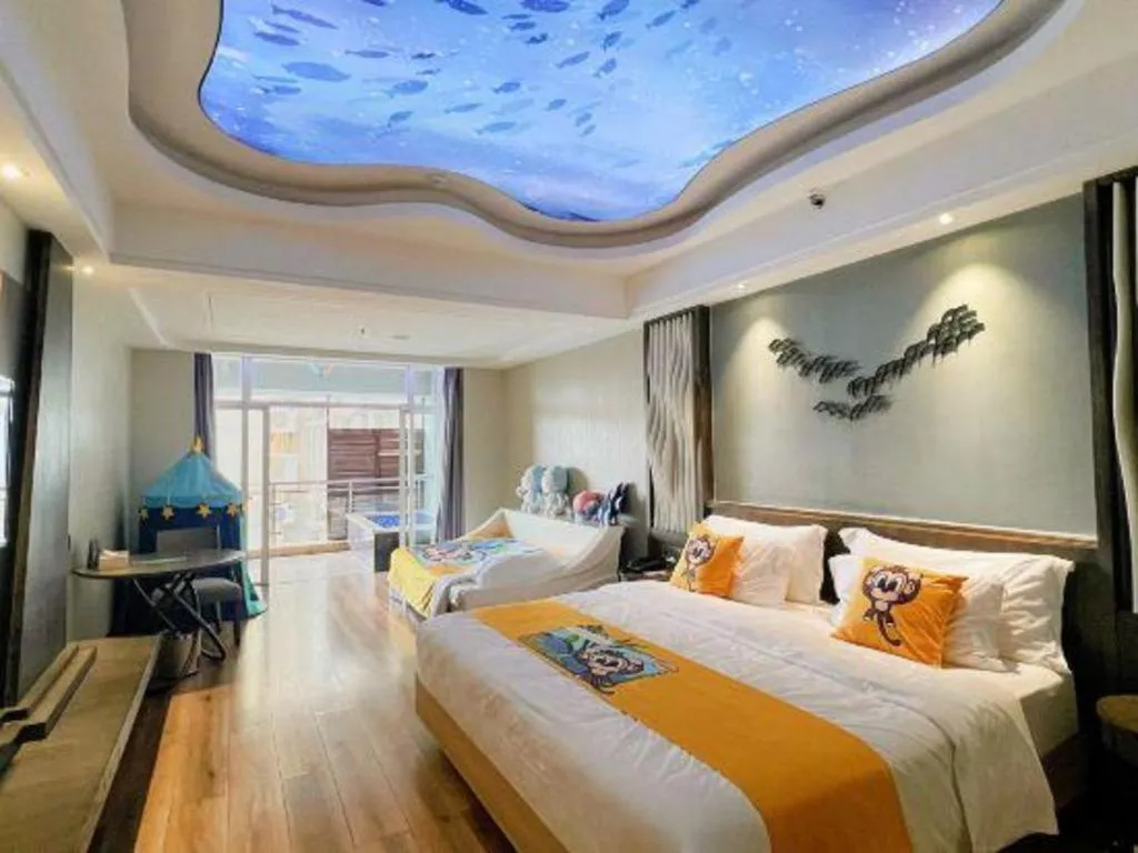 Bed in HuangMa holiday yacht view sea resort hotel