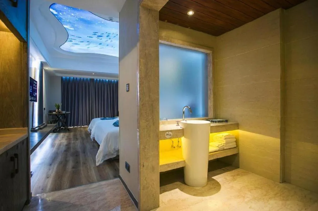 Bed in HuangMa holiday yacht view sea resort hotel