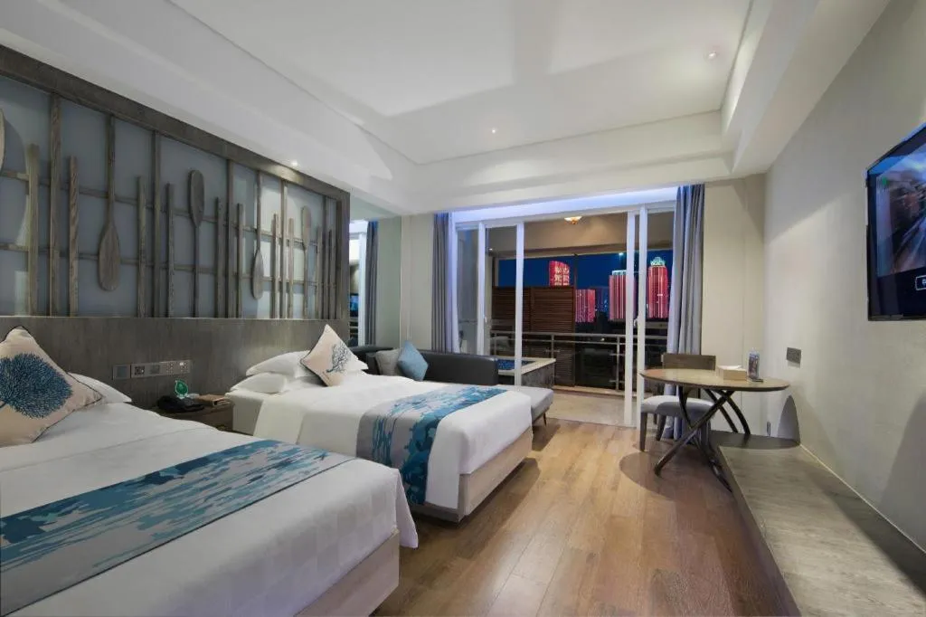 Bed in HuangMa holiday yacht view sea resort hotel