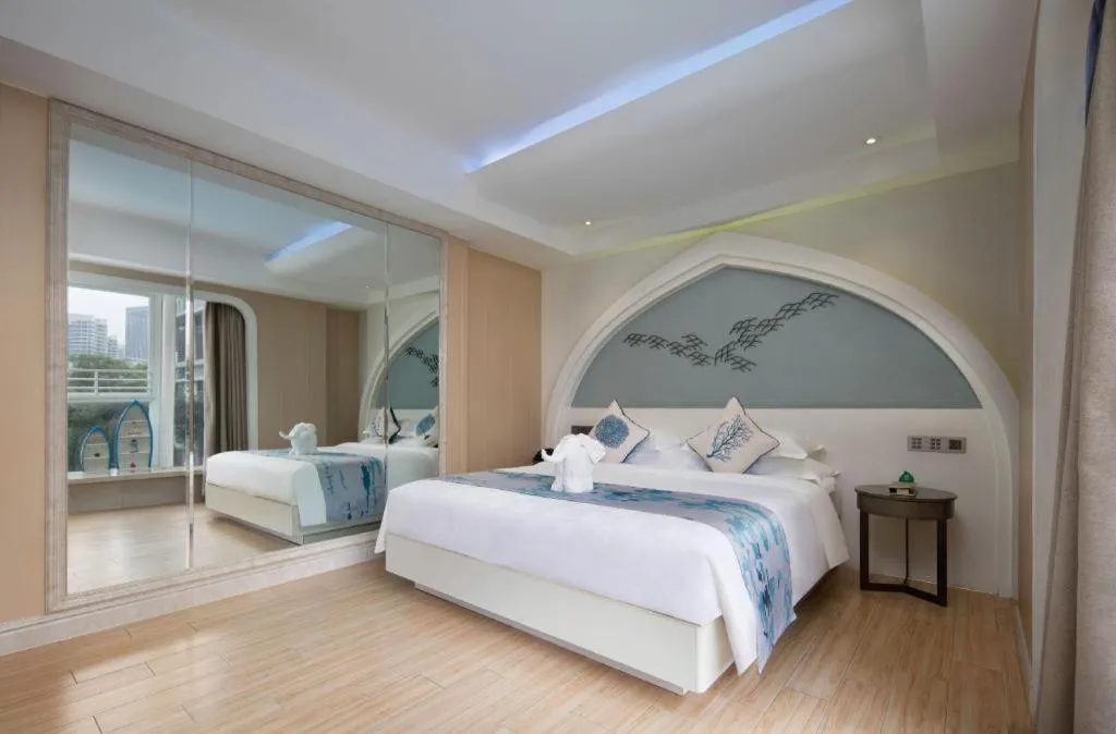 Bed in HuangMa holiday yacht view sea resort hotel