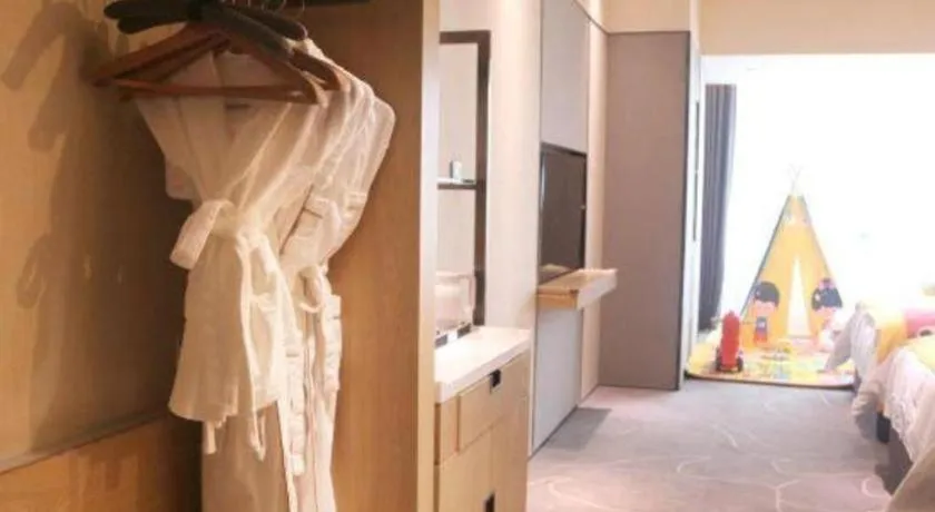 Bed in ZHONG DING HOTEL