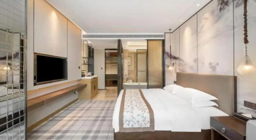 Bed in ZHONG DING HOTEL