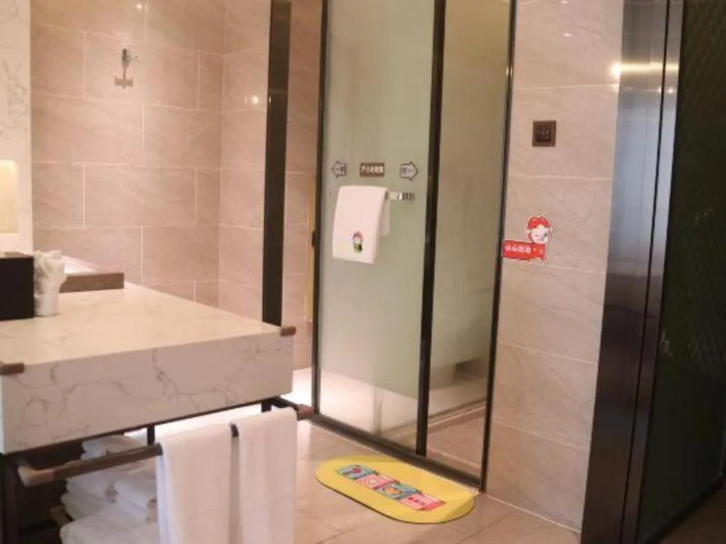 Bed in ZHONG DING HOTEL