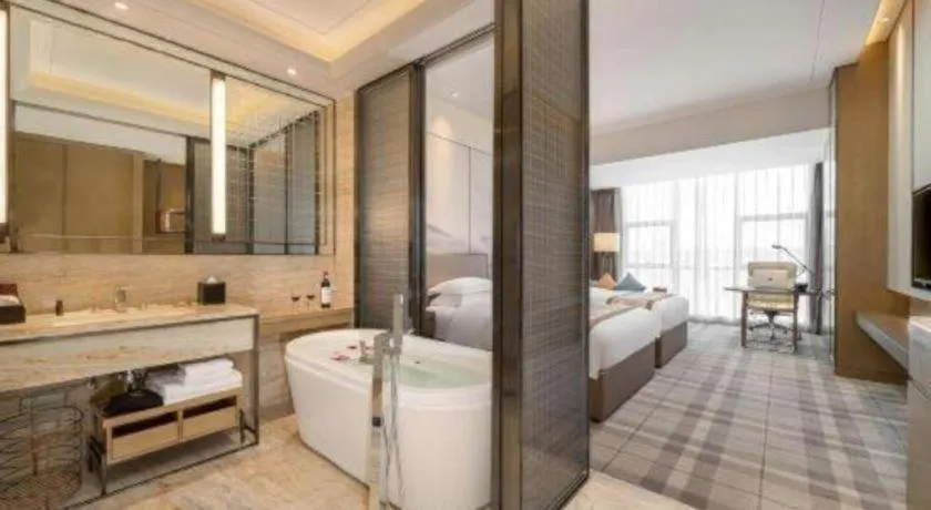 Bed in ZHONG DING HOTEL