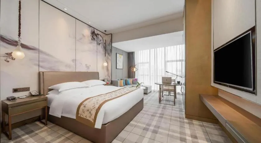 Bed in ZHONG DING HOTEL