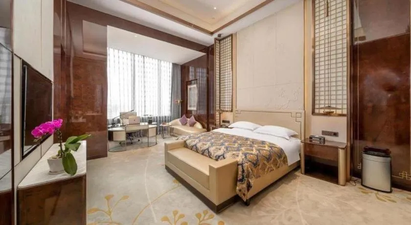 Bed in ZHONG DING HOTEL