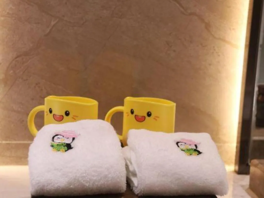 Bed in ZHONG DING HOTEL