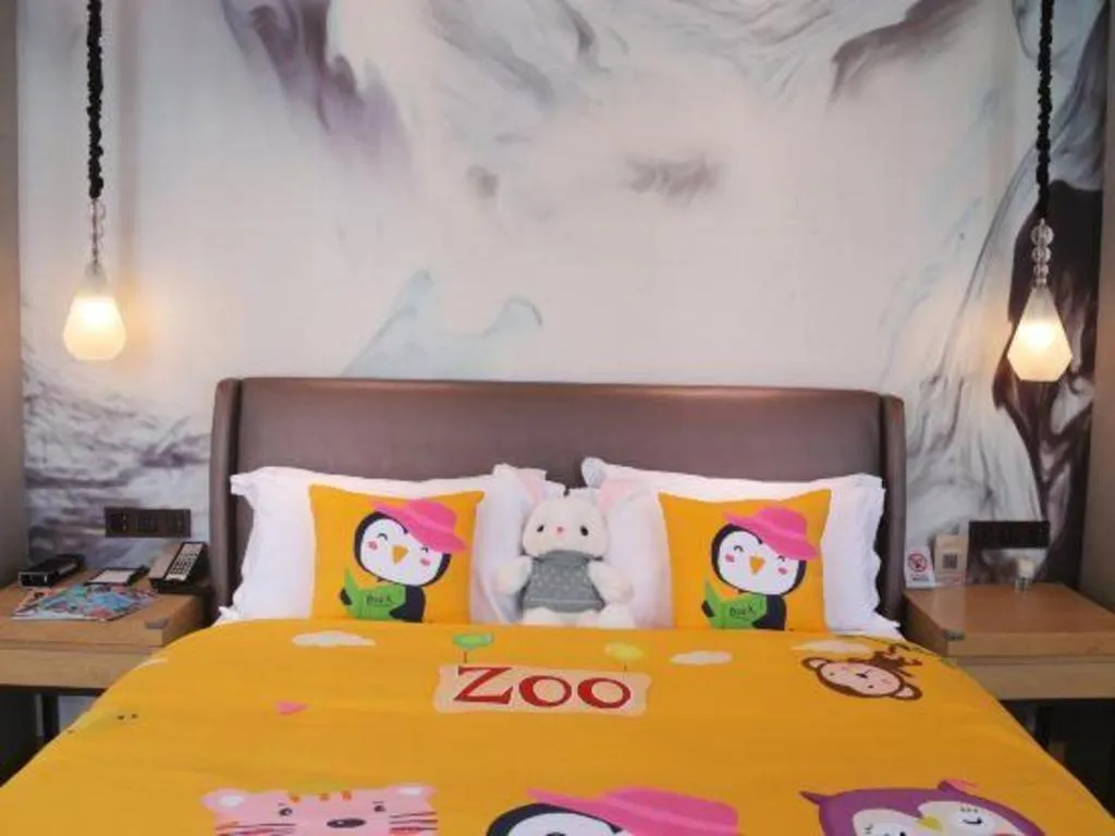 Bed in ZHONG DING HOTEL