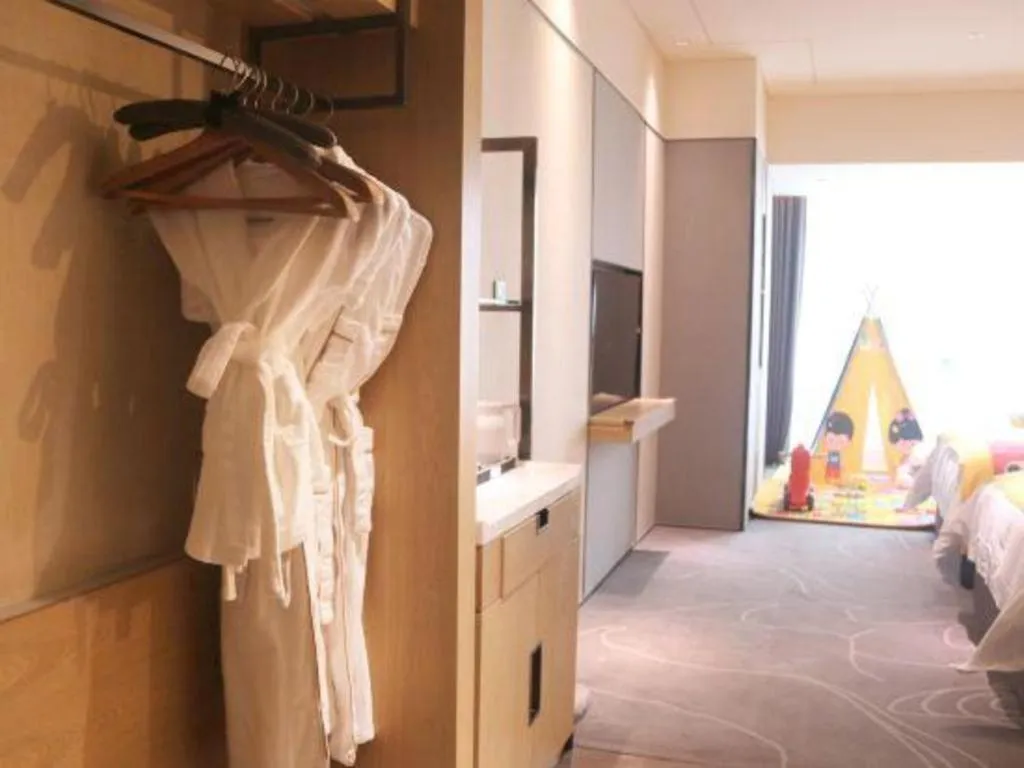 Bed in ZHONG DING HOTEL