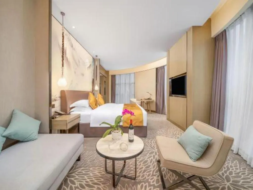 Bed in ZHONG DING HOTEL