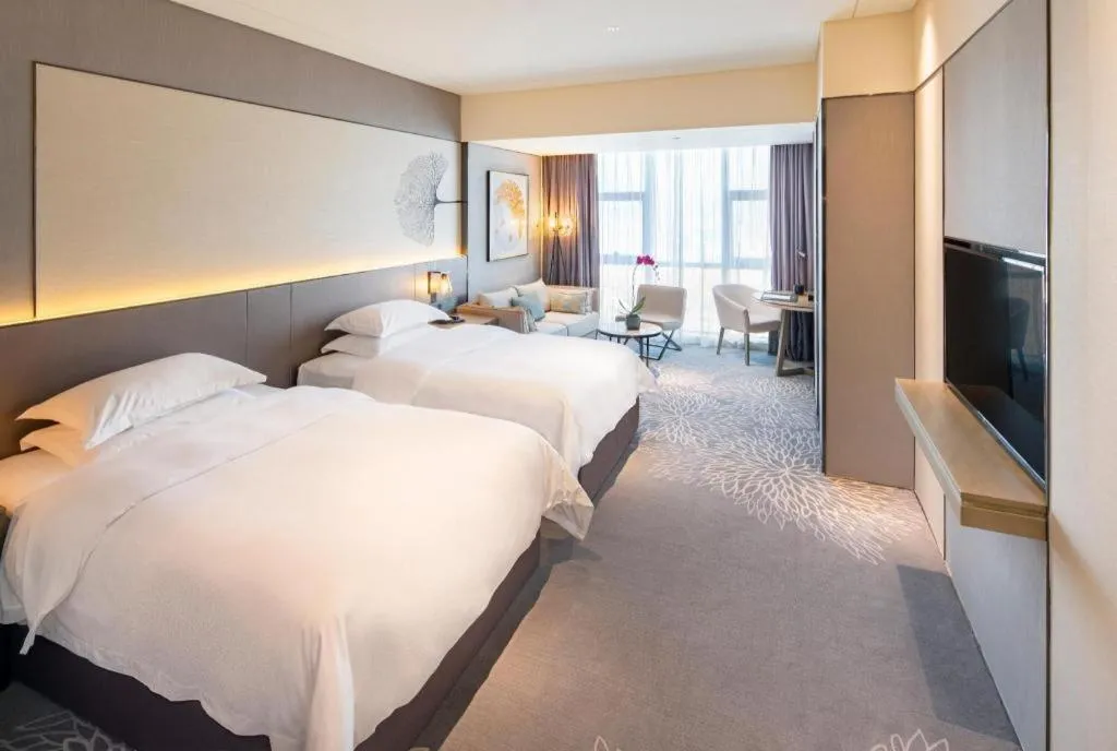 Bed in ZHONG DING HOTEL