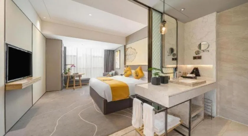 Bed in ZHONG DING HOTEL