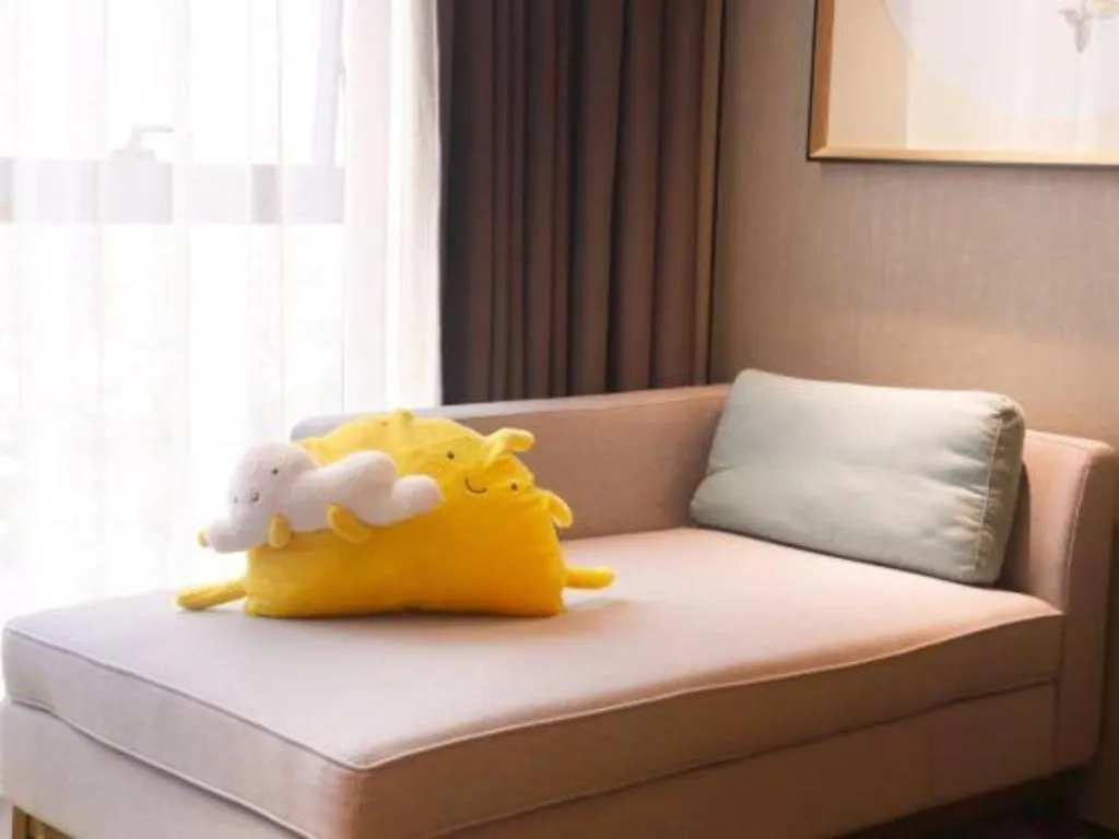 Bed in ZHONG DING HOTEL