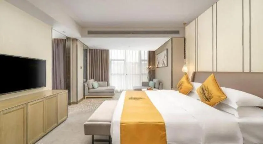 Bed in ZHONG DING HOTEL