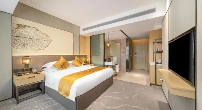 Bed in ZHONG DING HOTEL