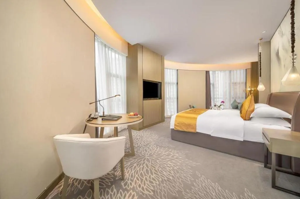 Bed in ZHONG DING HOTEL