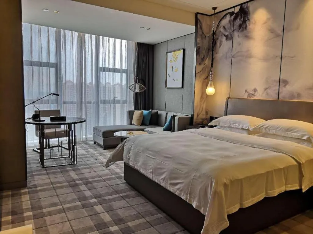 Bed in ZHONG DING HOTEL