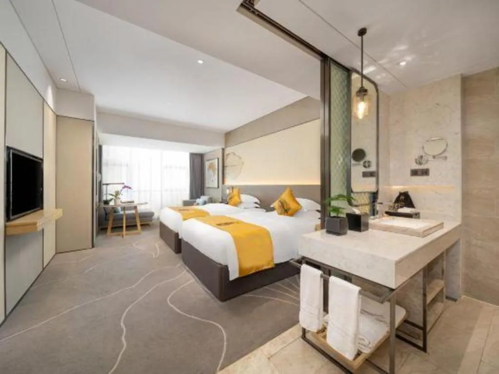 Bed in ZHONG DING HOTEL