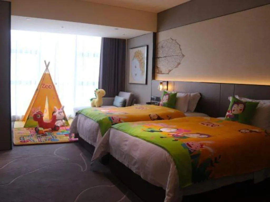 Bed in ZHONG DING HOTEL