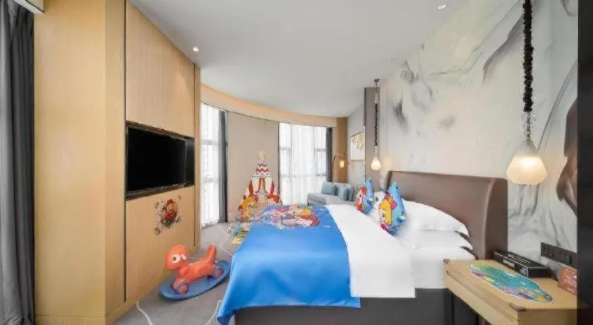 Bed in ZHONG DING HOTEL