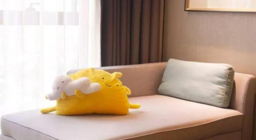 Bed in ZHONG DING HOTEL