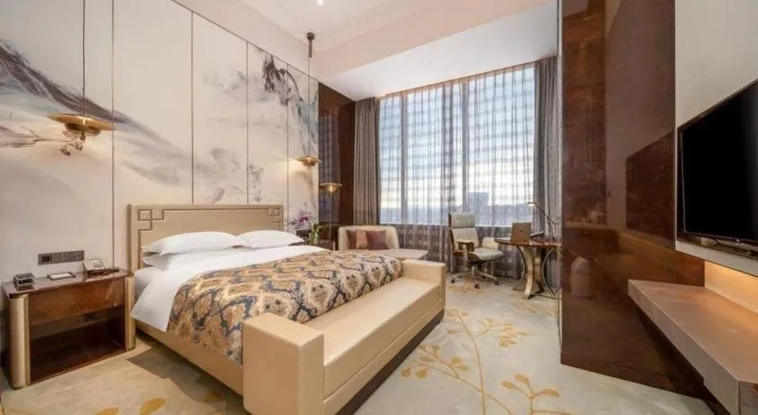 Bed in ZHONG DING HOTEL