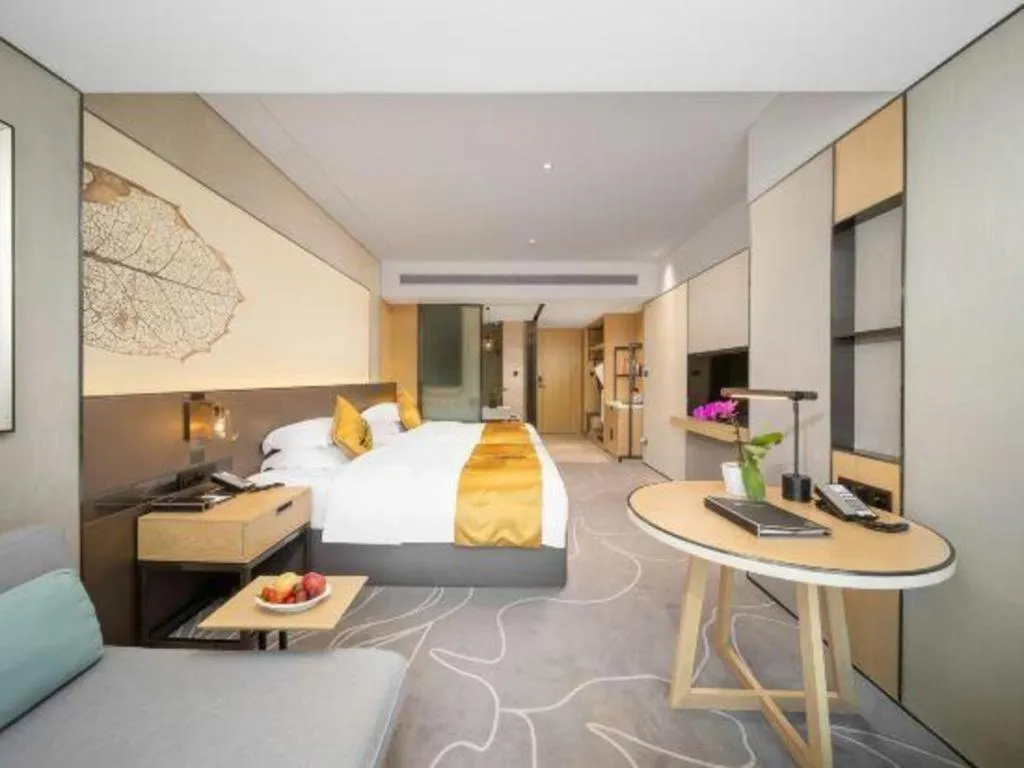 Bed in ZHONG DING HOTEL