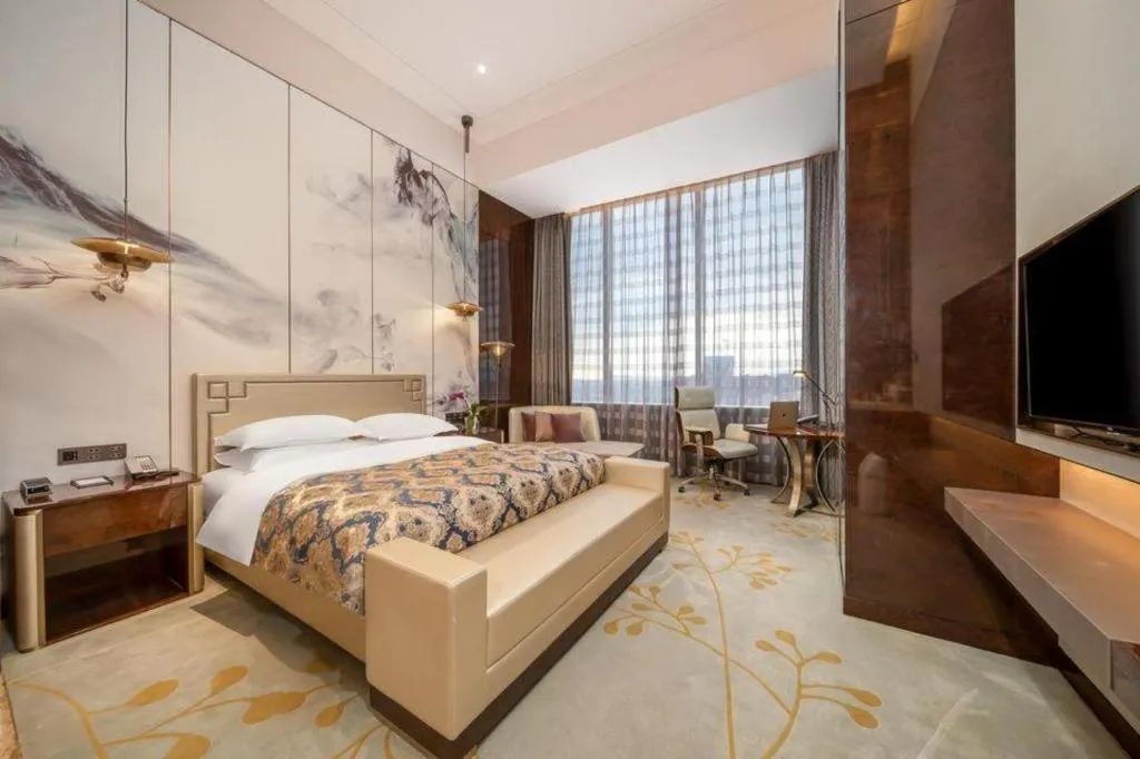 Bed in ZHONG DING HOTEL