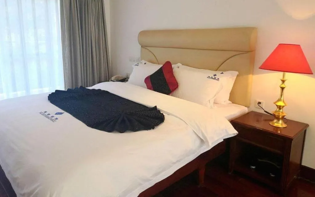 Bed in Shaoguan Palace International Resorts
