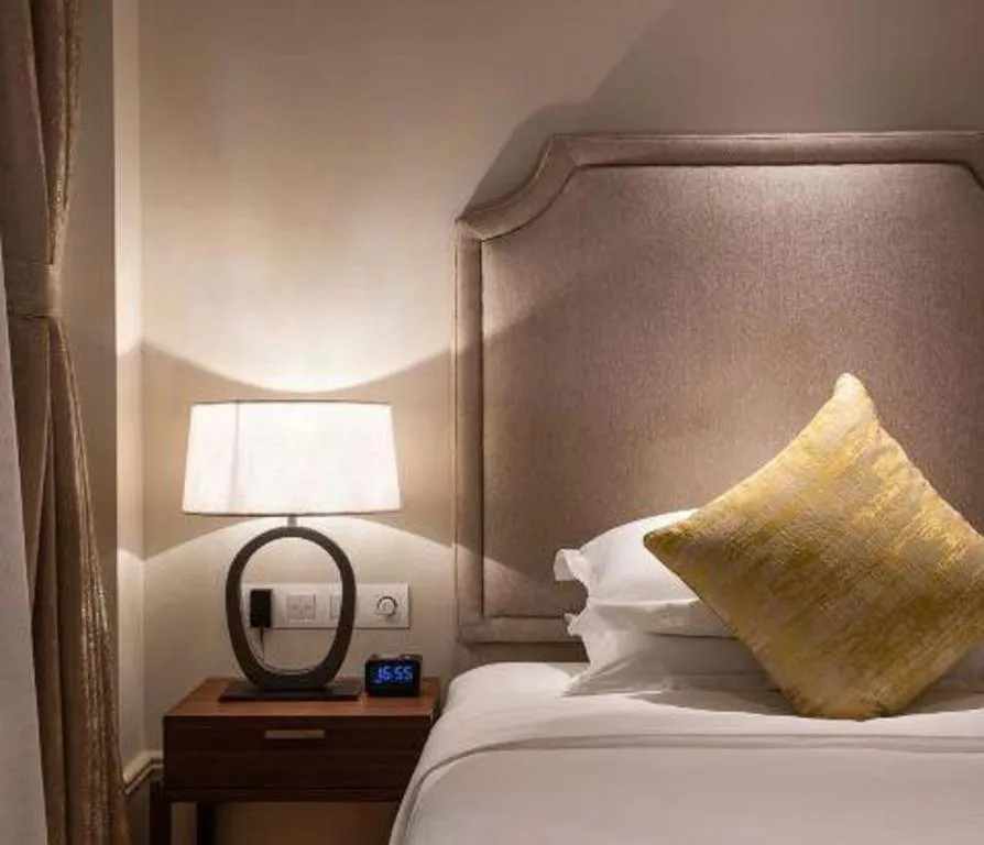 Bed in Donghai Xianhucheng Huanglong Hotel