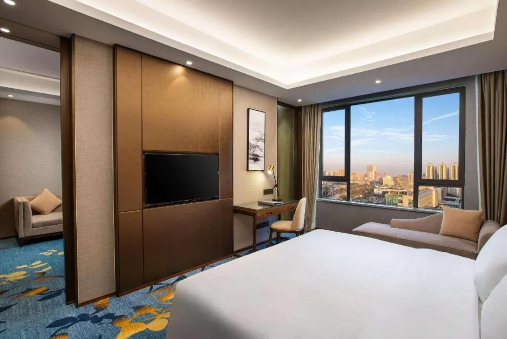 Bed in Ramada Encore by Wyndham Wuhan Caidian