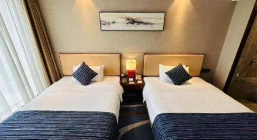 Bed in Ramada Encore by Wyndham Wuhan Caidian