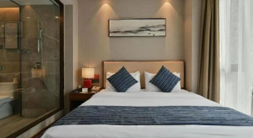 Bed in Ramada Encore by Wyndham Wuhan Caidian