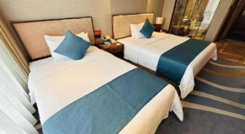 Bed in Ramada Encore by Wyndham Wuhan Caidian