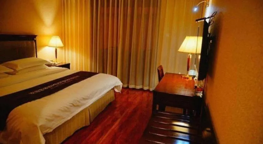 Bed in Hujialou Hot Spring Hotel